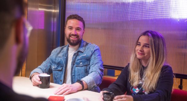 Two ByteDance MBA graduates discussing work and their projects.